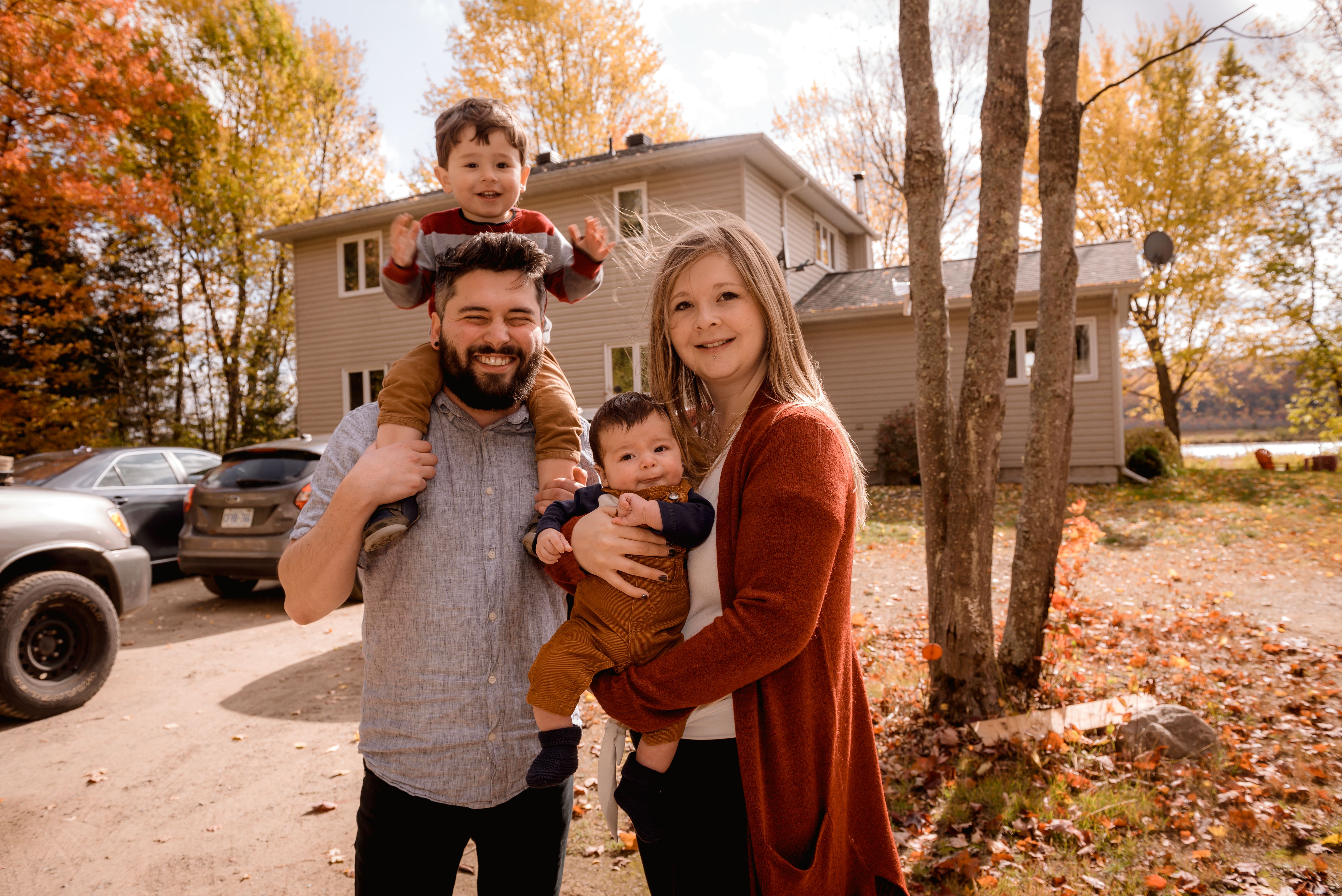 Family smiling together after their visit